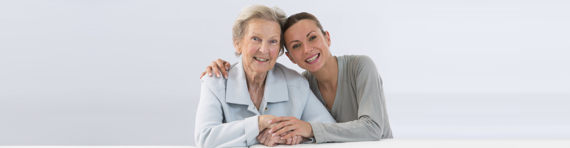 Young women takes care of an elderly woman.